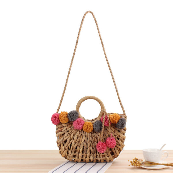 The New Hollow Hand-carried Straw Woven Bag Cute Colored Fur Balls